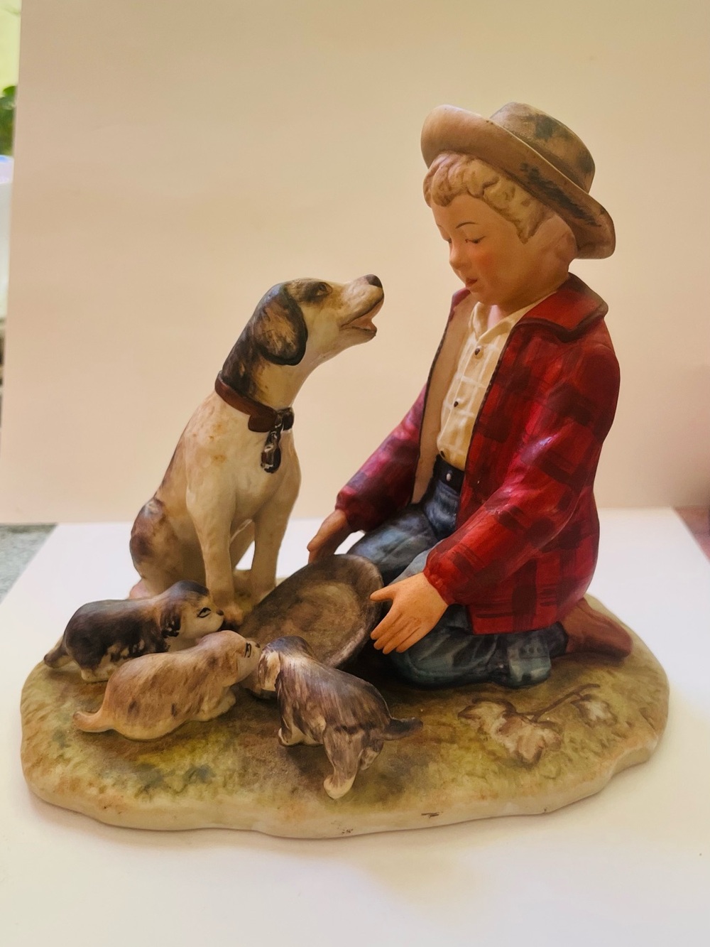 Hand-Painted Boy and Dog Figurine with Puppies - Red Jacket